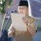 Kepala Dinas PMD Abdi Jaya Pohan saat mengikuti apel gabungan di Halaman Bandan Kepegawaian Pelatihan dan Pendidikan Kabupaten Labuhanbatu, Senin (5/623). (Foto/diksimerdeka.com)