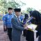 Bupati Asahan H. Surya BSc memimpin Upacara Hari Bela Negara ke-75 di Halaman Kantor Bupati Asahan