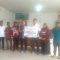Manajer TJSL Perum Bulog Tri Augusta Dharma S memberikan bantuan Air Bersih ke Desa Bora, Kecamatan Sigi Kota, Kabupaten Sigi, Rabu (24/01/2024). Foto: dok/Perum Bulog