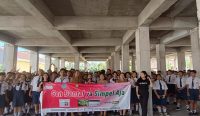 Tim P2DD Kota Denpasar melakukan roadshow budaya transaksi keuangan ke SMP di Kota Denpasar. Foto: dok/pribadi
