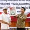 Kepala BPK Bali I Gusti Ngurah Satria Perwira bersama Wali Kota Denpasar I Gusti Ngurah Jaya Negara saat penyerahan Laporan Keuangan Pemerintah Kota Denpasar Unaudited Tahun 2024, Rabu (26/03/2025). Foto: dok/Pemkot Denpasar