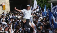 Kelompok nasionalis sayap kanan Israel berkumpul dalam pawai bendera tahunan di dekat Gerbang Damaskus, Kota Tua Yerusalem.