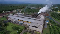Pabrik Kelapa Sawit Bah Jambi milik PTPN IV PalmCo di tengah kawasan perkebunan sawit Indonesia.