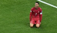 Cristiano Ronaldo Portugal vs Uzbekistan bereaksi kecewa setelah peluang emasnya gagal berbuah gol pada laga Grup K Piala Dunia 2026.