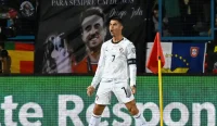 Portugal vs Kongo : Cristiano Ronaldo melakukan selebrasi bersama Timnas Portugal di depan tribune yang menampilkan penghormatan untuk Diogo Jota jelang Piala Dunia 2026.