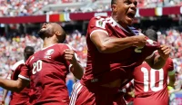 Qatar vs Swiss Piala Dunia 2026: Pedro Miguel merayakan gol penyama kedudukan dramatis Qatar pada masa injury time yang memastikan hasil imbang 1-1 melawan Swiss.