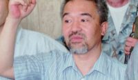 Kozo Okamoto saat ditangkap otoritas Lebanon pada 1997 terkait dugaan pemalsuan paspor, beberapa tahun setelah dibebaskan dari penjara Israel.