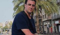 Youssef El Abbas, migran asal Maroko, berada di Ceuta setelah menyeberangi perbatasan menuju wilayah Spanyol di Afrika Utara.